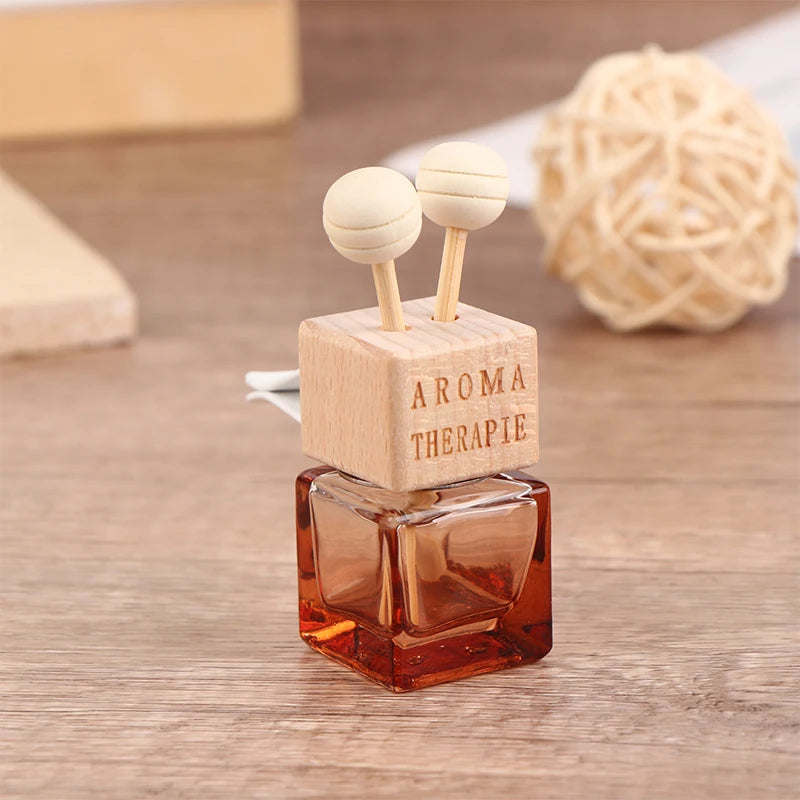 Stylish Car Air Freshener Pendant - Aromatherapy Glass Diffuser Bottle for a Refreshing Drive
