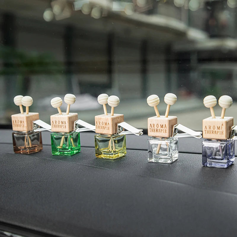 Stylish Car Air Freshener Pendant - Aromatherapy Glass Diffuser Bottle for a Refreshing Drive