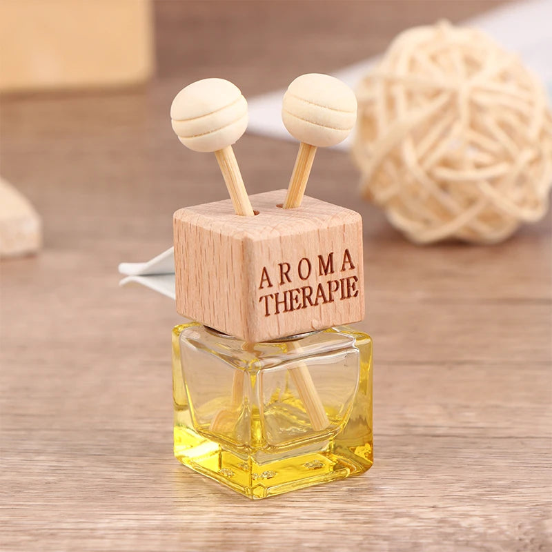 Stylish Car Air Freshener Pendant - Aromatherapy Glass Diffuser Bottle for a Refreshing Drive