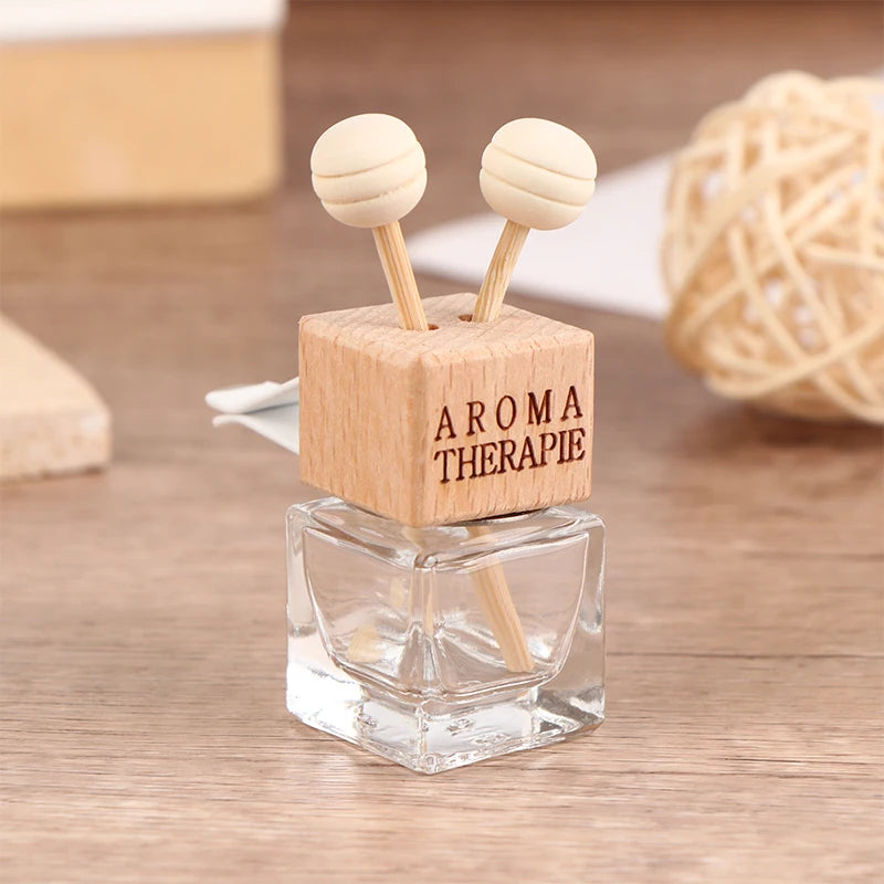 Stylish Car Air Freshener Pendant - Aromatherapy Glass Diffuser Bottle for a Refreshing Drive