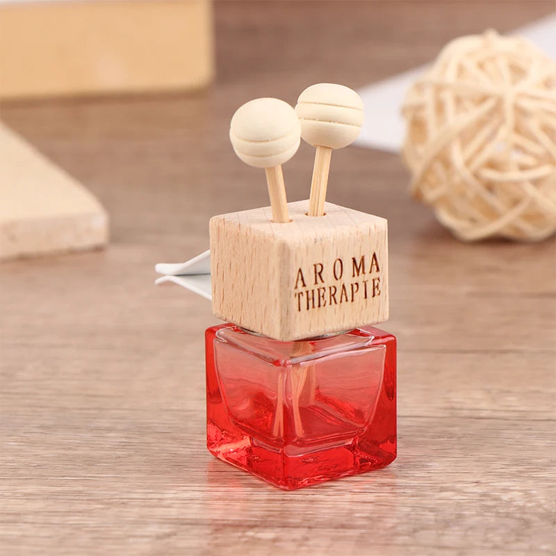Stylish Car Air Freshener Pendant - Aromatherapy Glass Diffuser Bottle for a Refreshing Drive