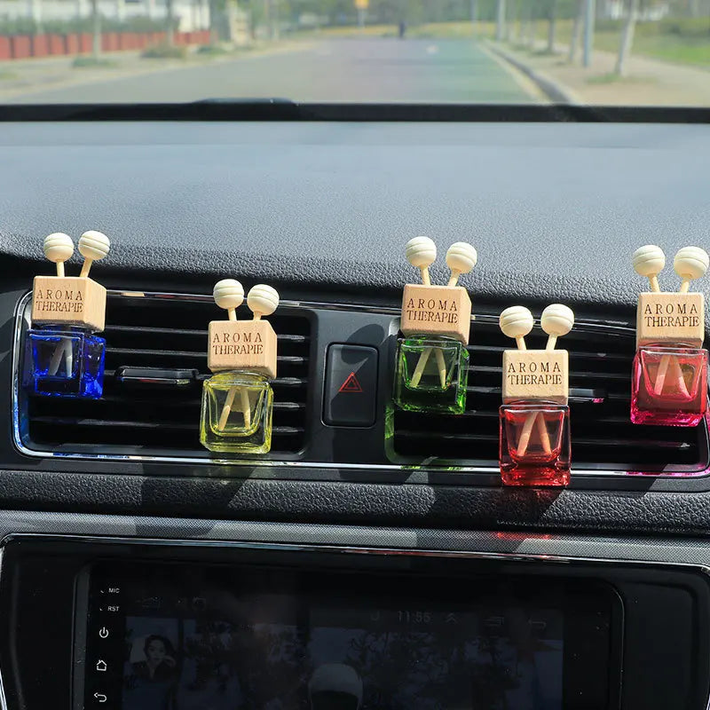 Stylish Car Air Freshener Pendant - Aromatherapy Glass Diffuser Bottle for a Refreshing Drive